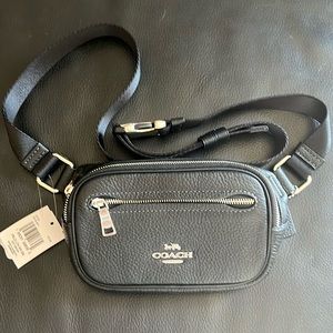 Coach brand mini belt bag.
